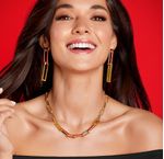 Set-collar-y-aretes-rojos-ba�ados-en-oro